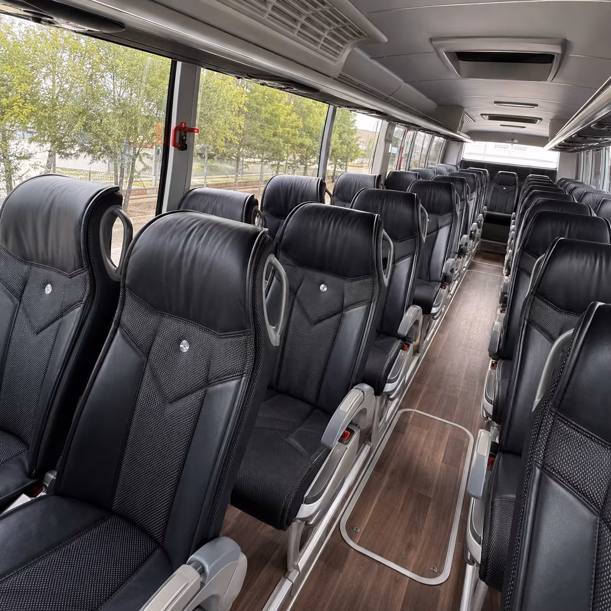long distance charter buses from pflugerville to dallas and dfw